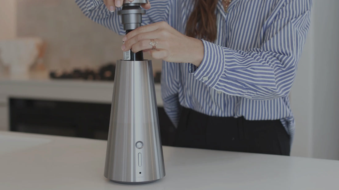 woman changing enso diffuser