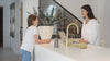 Mom and daughter next to mini Enso diffuser
